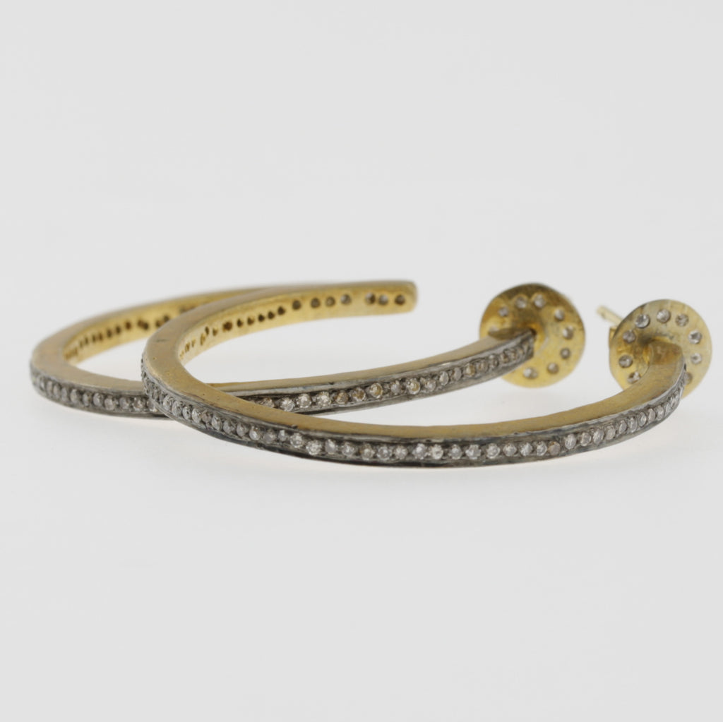 Black diamond hoops in silver and yellow gold