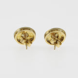 Black diamond studs in silver and yellow gold