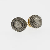 Black diamond studs in silver and yellow gold