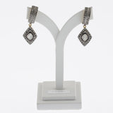 Black diamonds in silver and yellow gold studs with diamond drop earrings