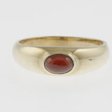 Garnet yellow gold band ring