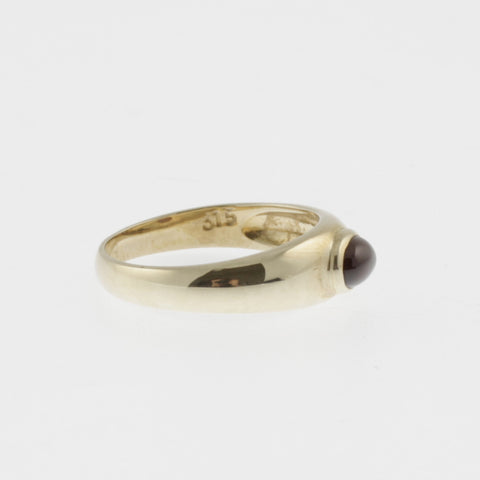 Garnet yellow gold band ring