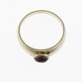 Garnet yellow gold band ring