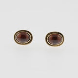 Garnet yellow gold oval studs