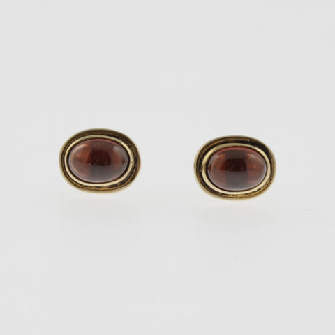 Garnet yellow gold oval studs