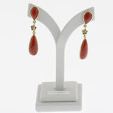Meditteranean coral cabachon dual tear drop earrings with flower detail in yellow gold