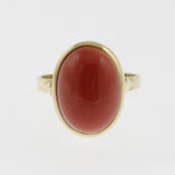 Meditteranean coral cabachon ring in yellow gold