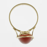 Meditteranean coral cabachon ring in yellow gold organic setting