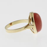 Meditteranean coral cabachon ring in yellow gold