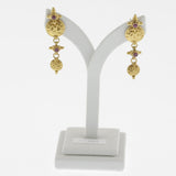 Yellow gold coral detailed earrings