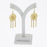 Yellow gold disc earrings with three drops